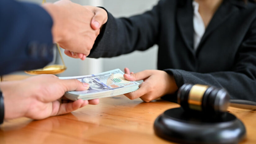 Lawyer and client exchanging money